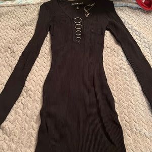 Long sleeve black dress with alittle boob action